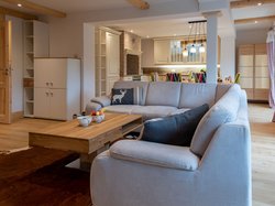 The sofa oasis in the living area provides a full view all the way to the eat-in kitchen.